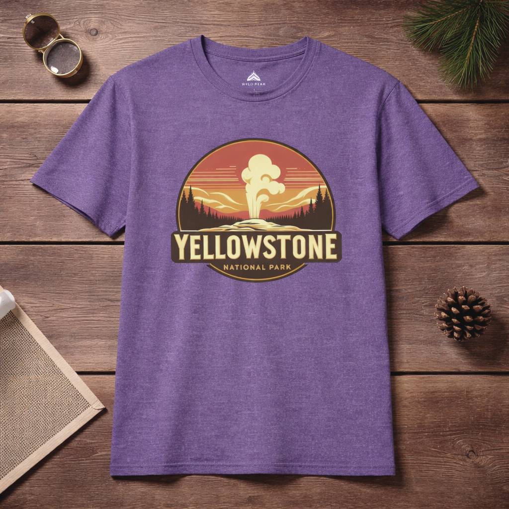 Purple t-shirt with Yellowstone National Park graphic on a wooden surface