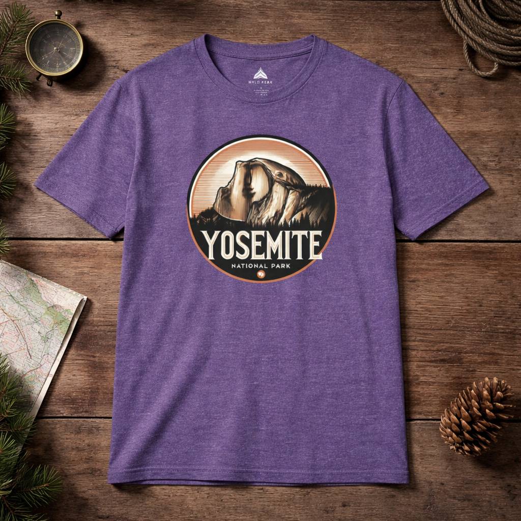 Purple t-shirt with Yosemite National Park graphic on a wooden surface