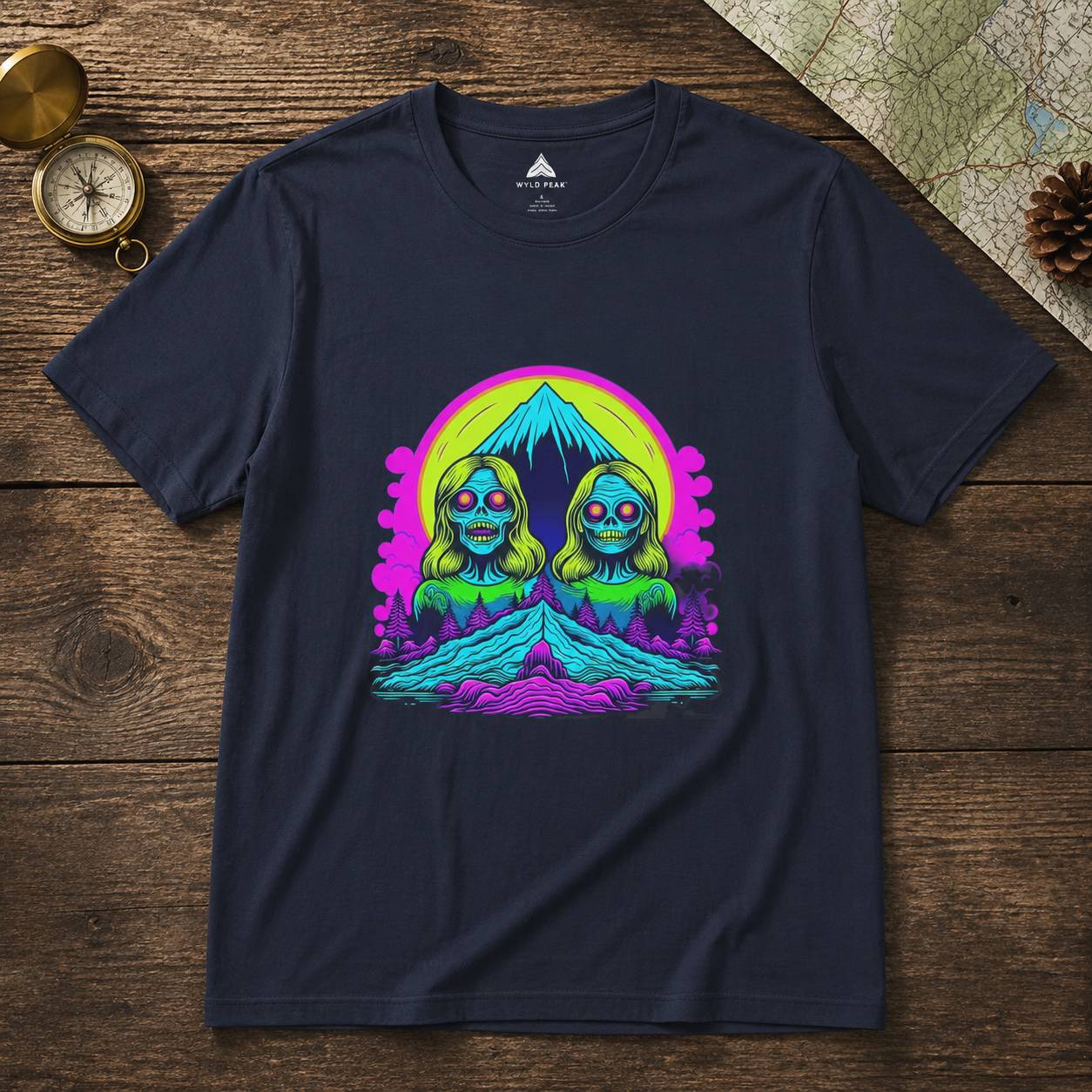 Navy blue t-shirt with colorful graphic design on a wooden surface